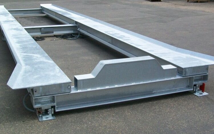 Galvanised set-up scales for skip container with stop